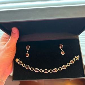 Brand new red earrings and bracelet